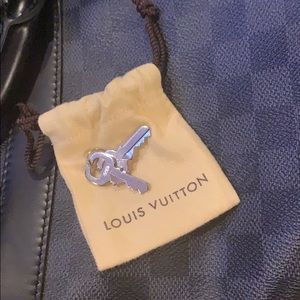 LV Keepall Bandouliere 45 and LV Toiletry Pouch